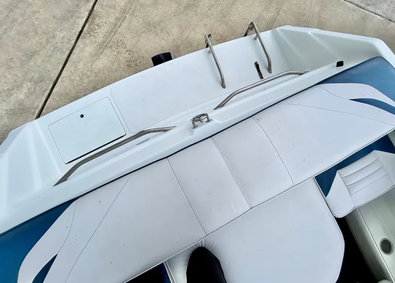Slide: The Image of Rear view of a 1993 Mariah MX20 C boat with white seating area. - 40