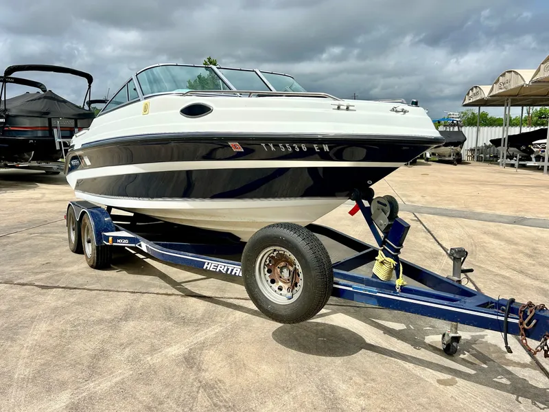 Slide: The Image of 1993 Mariah MX20 C boat on trailer, ready for water adventure. - 5