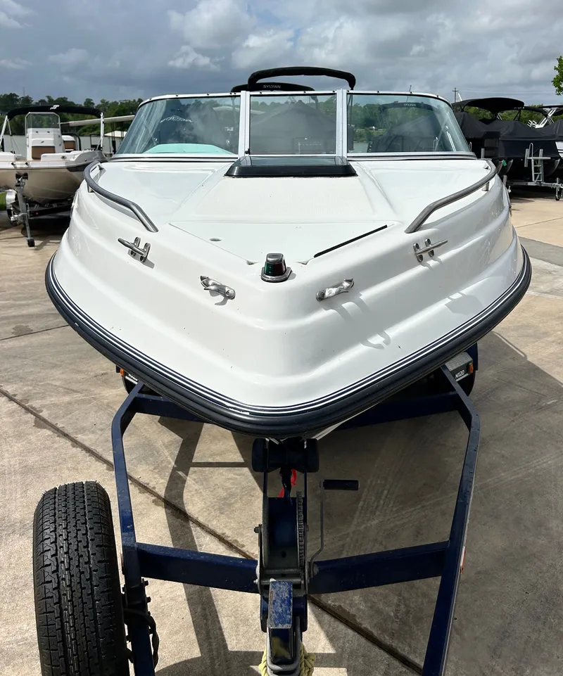 Slide: The Image of 1993 Mariah MX20 C boat on a trailer. - 7