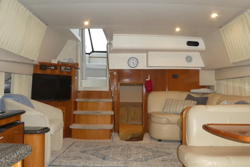 Slide: The Image of Interior of 2006 Carver 366 Motor Yacht with luxurious seating and modern amenities. - 24