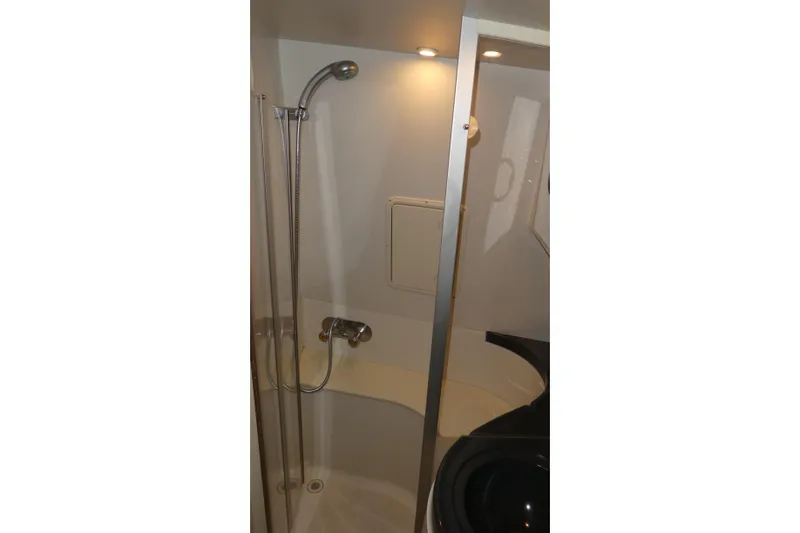 Slide: The Image of Bathroom interior of 2006 Carver 366 Motor Yacht with shower and modern fixtures. - 33