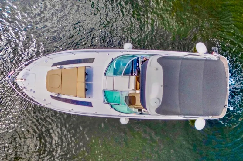 Slide: The Image of Overhead view of 2015 Sea Ray Sundancer 350 yacht on water. - 2