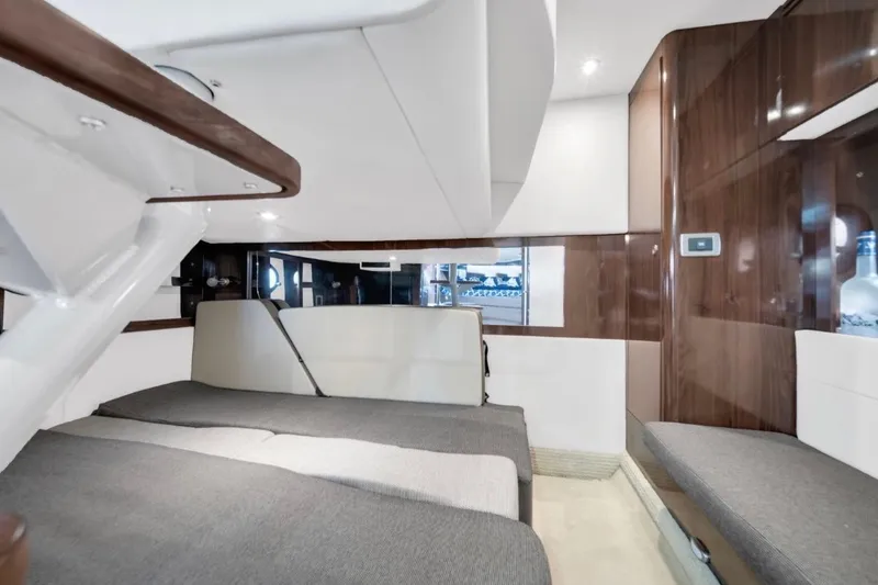 Slide: The Image of Interior cabin of 2015 Sea Ray Sundancer 350 yacht, featuring modern design and comfortable seating. - 8