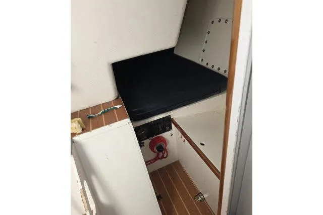 Slide: The Image of Interior cabin view of a 1986 Bill Lee Yachts Santa Cruz 50 sailboat. - 19