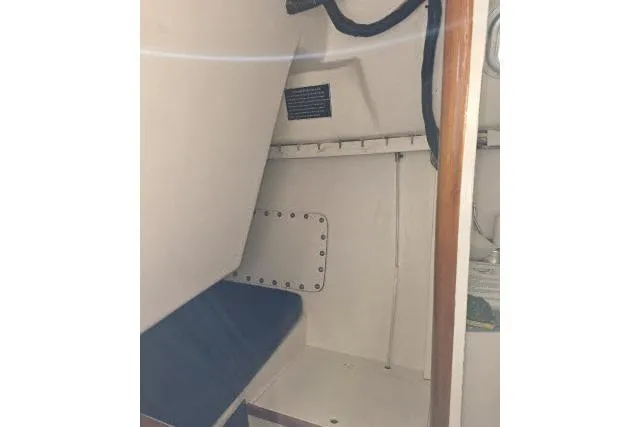 Slide: The Image of Interior cabin view of a 1986 Bill Lee Yachts Santa Cruz 50 sailboat. - 21