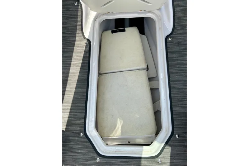 Slide: The Image of Storage compartment of 2017 Four Winns 180 Horizon boat with cushioned interior. - 40