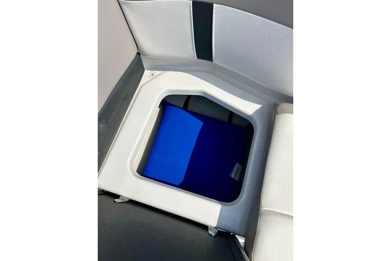 Slide: The Image of Storage compartment in 2017 Four Winns 180 Horizon boat with blue interior. - 50