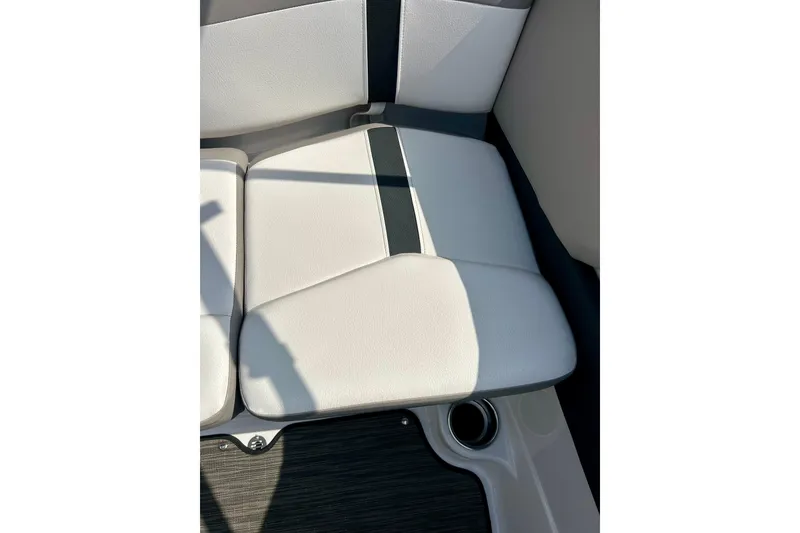 Slide: The Image of 2017 Four Winns 180 Horizon boat seat with white and black upholstery. - 53