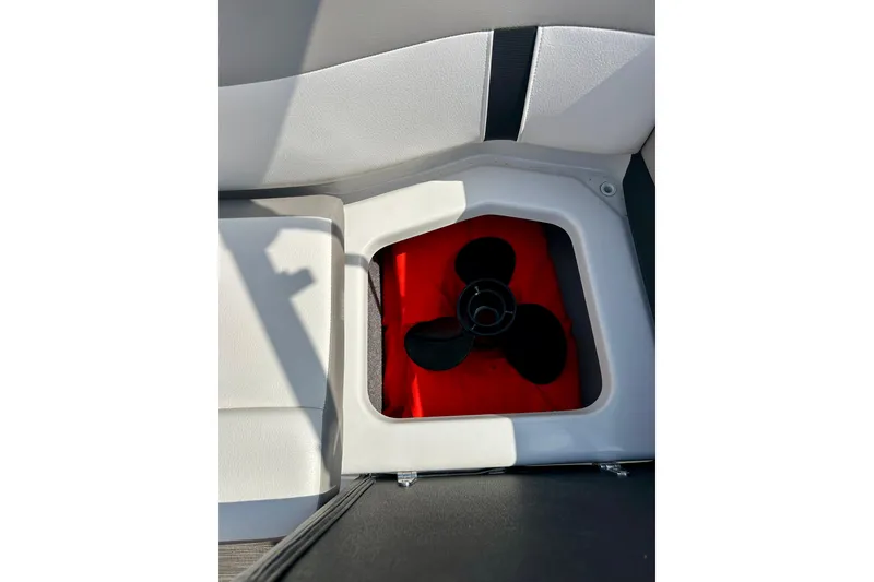 Slide: The Image of Storage compartment with propeller in 2017 Four Winns 180 Horizon boat. - 54