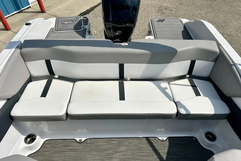 Slide: The Image of 2017 Four Winns 180 Horizon boat interior with gray and white seating. - 55