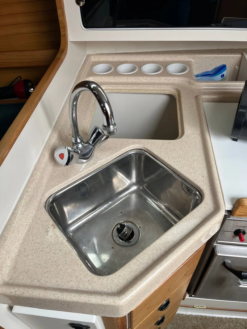 Slide: The Image of Galley area of a 2000 Catalina 28 MkII yacht. - 11