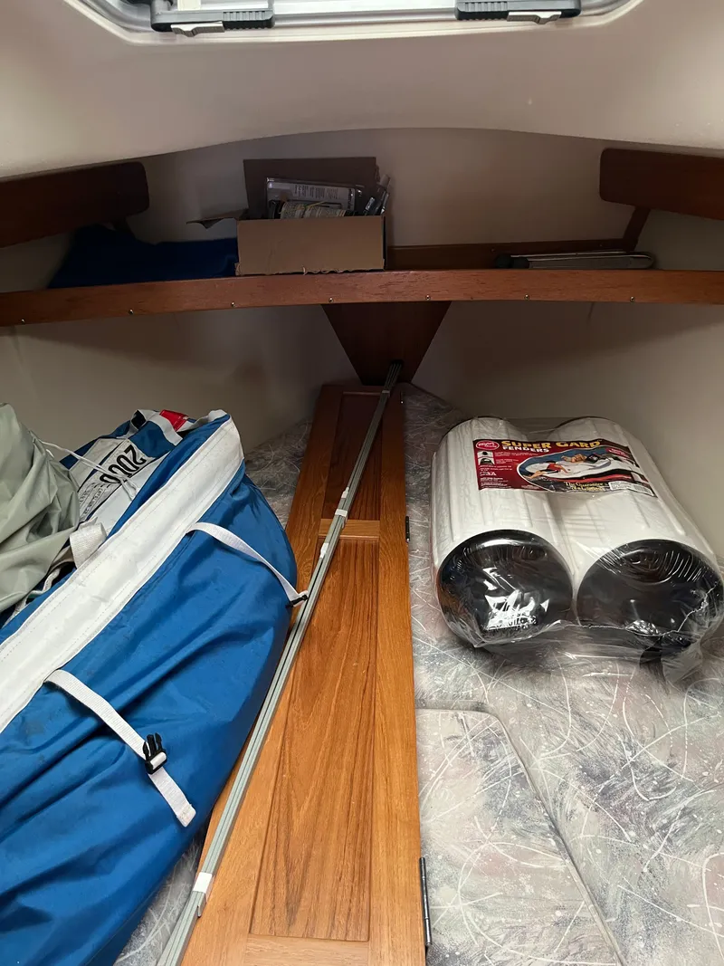 Slide: The Image of Interior of a Catalina 28 MkII yacht with storage and accessories. - 15