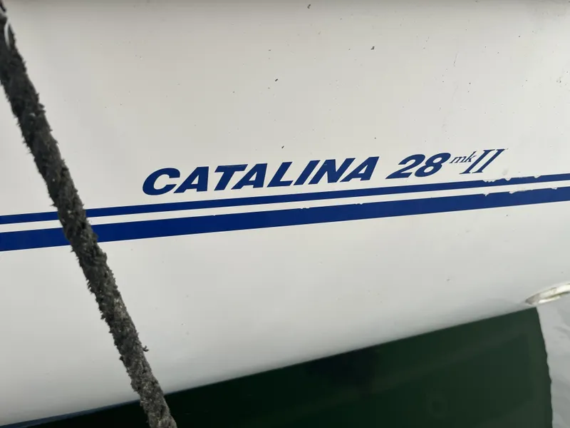 Slide: The Image of Close-up of Catalina 28 MkII lettering on a boat hull. - 2