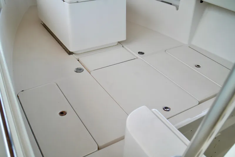 Slide: The Image of 2019 Invincible 36 Open Fisherman boat deck with storage compartments. - 14