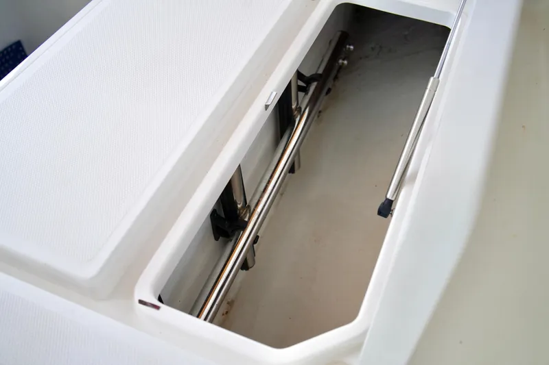 Slide: The Image of Open storage compartment on a 2019 Invincible 36 Open Fisherman boat. - 16