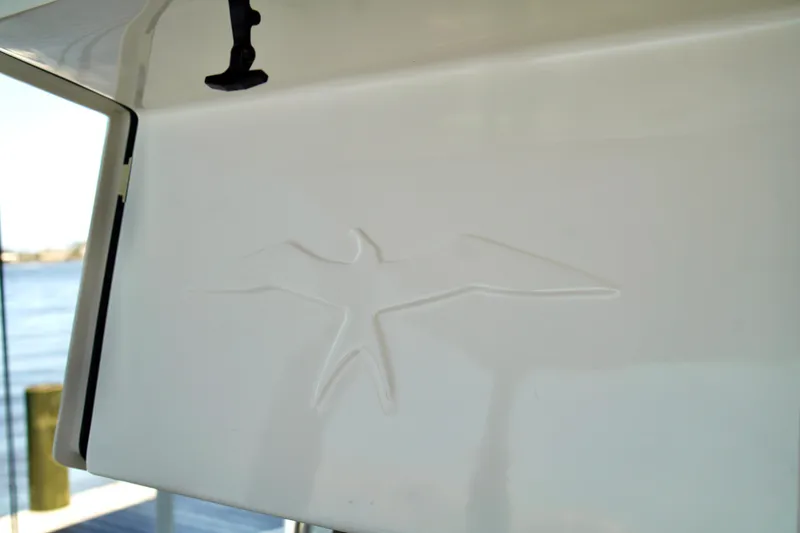 Slide: The Image of 2019 Invincible 36 Open Fisherman boat interior with embossed bird design detail. - 19