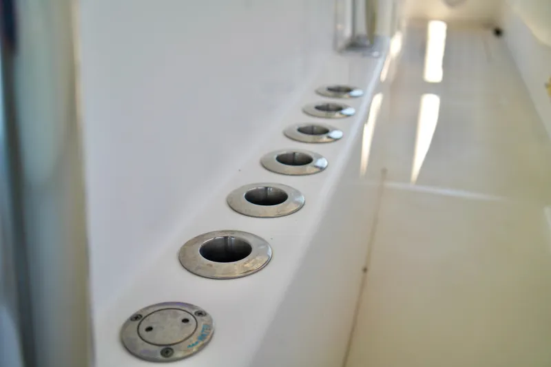 Slide: The Image of 2019 Invincible 36 Open Fisherman boat rod holders on deck. - 27