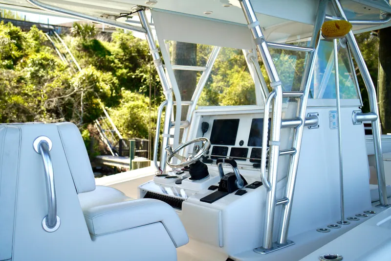 Slide: The Image of 2019 Invincible 36 Open Fisherman boat cockpit with modern controls and seating. - 29