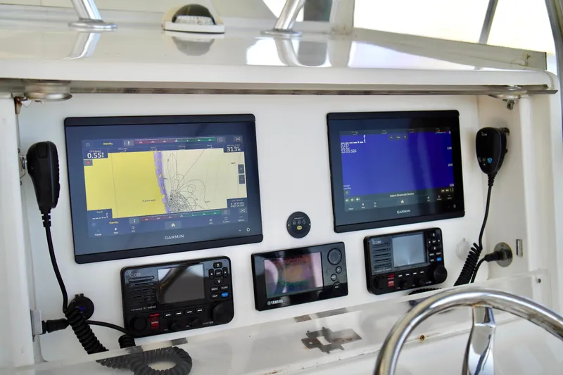 Slide: The Image of Control panel of a 2019 Invincible 36 Open Fisherman with Garmin navigation displays. - 33