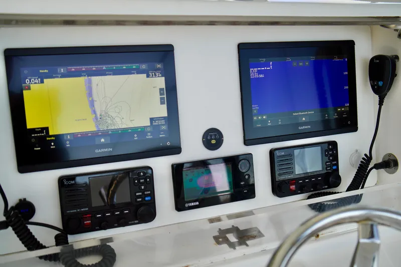 Slide: The Image of Control panel of 2019 Invincible 36 Open Fisherman with Garmin navigation displays. - 34