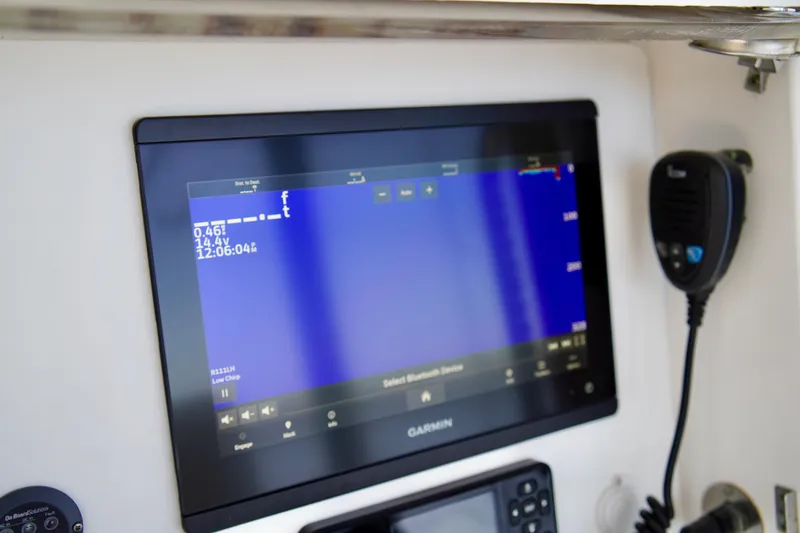 Slide: The Image of Garmin marine display on 2019 Invincible 36 Open Fisherman boat dashboard. - 36