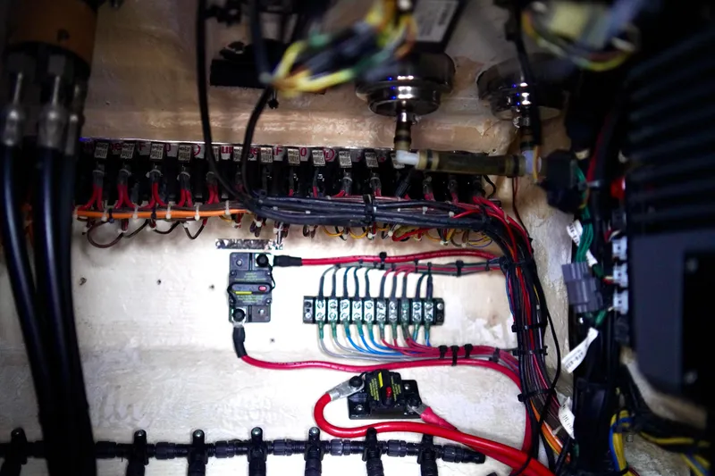 Slide: The Image of Electrical wiring system inside a 2019 Invincible 36 Open Fisherman boat. - 43