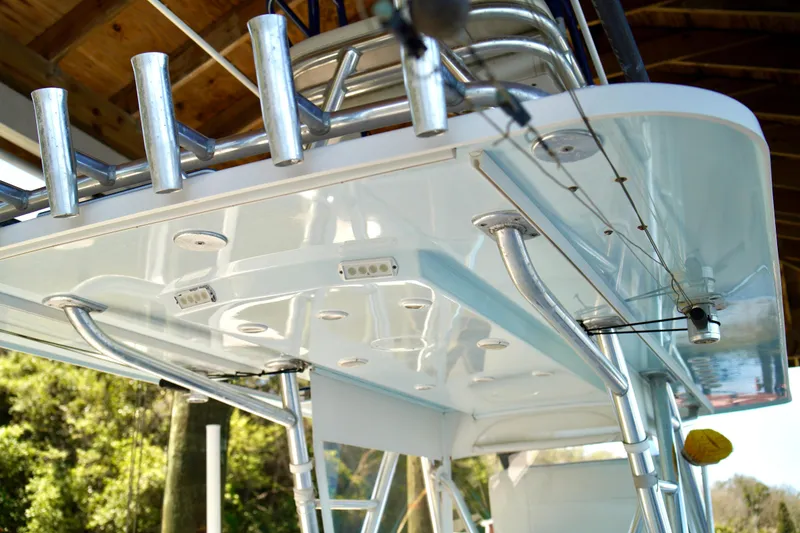 Slide: The Image of 2019 Invincible 36 Open Fisherman boat with rod holders and canopy structure. - 49