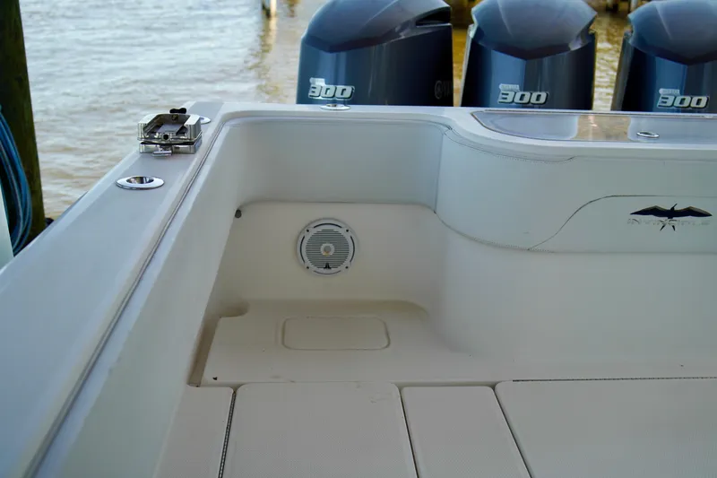 Slide: The Image of 2019 Invincible 36 Open Fisherman boat interior with Yamaha 300 engines in background. - 63