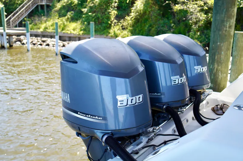 Slide: The Image of Triple Yamaha 300 outboard engines on a 2019 Invincible 36 Open Fisherman boat. - 66