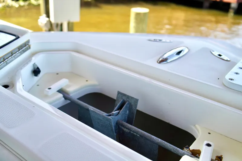 Slide: The Image of 2019 Invincible 36 Open Fisherman boat deck with storage compartment and cleats. - 8