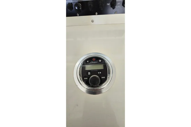 Slide: The Image of Control panel on a 1977 Bertram 42 Flybridge Motor Yacht dashboard. - 11