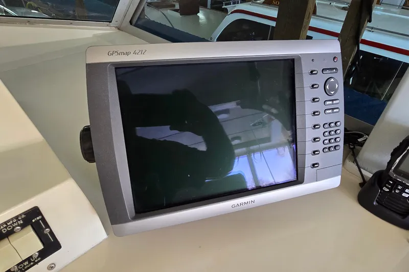 Slide: The Image of Garmin GPSmap 4212 on 1977 Bertram 42 Flybridge Motor Yacht dashboard. - 12