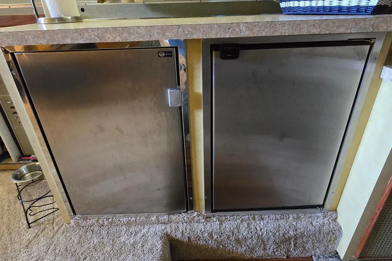 Slide: The Image of Stainless steel appliances in a 1977 Bertram 42 Flybridge Motor Yacht interior. - 53