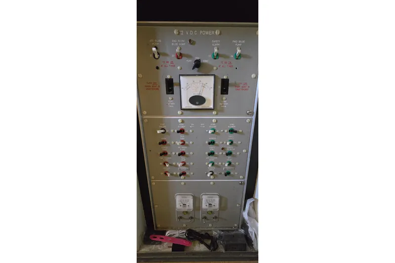 Slide: The Image of Electrical control panel of a 1977 Bertram 42 Flybridge Motor Yacht. - 54