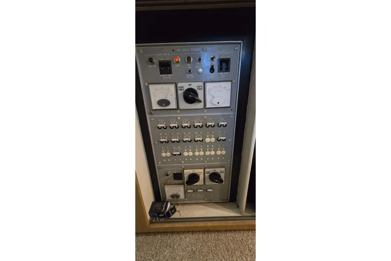 Slide: The Image of Electrical control panel on a 1977 Bertram 42 Flybridge Motor Yacht. - 55
