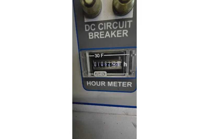 Slide: The Image of Hour meter reading 1062.7 hours on 1977 Bertram 42 Flybridge Motor Yacht. - 59