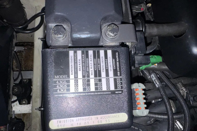 Slide: The Image of Engine component with specifications label for 2001 Regal Commodore 2760 boat. - 23