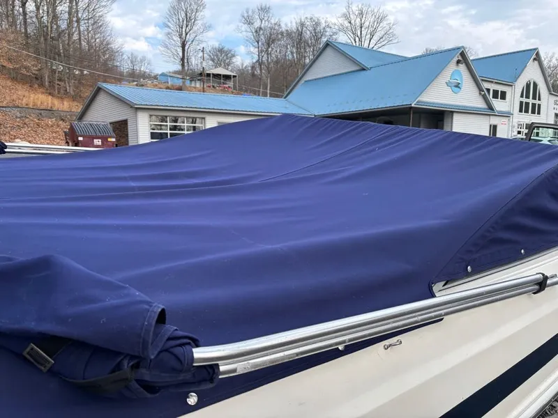 Slide: The Image of Larson 850 boat with blue cover, 2011 model. - 7
