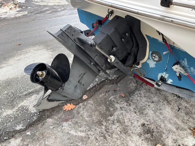 Slide: The Image of Rear view of a 2011 Larson 850 boat with outboard motor. - 9