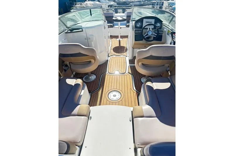 Slide: The Image of 2018 Godfrey Hurricane SD2486 boat interior with seating and steering console. - 5