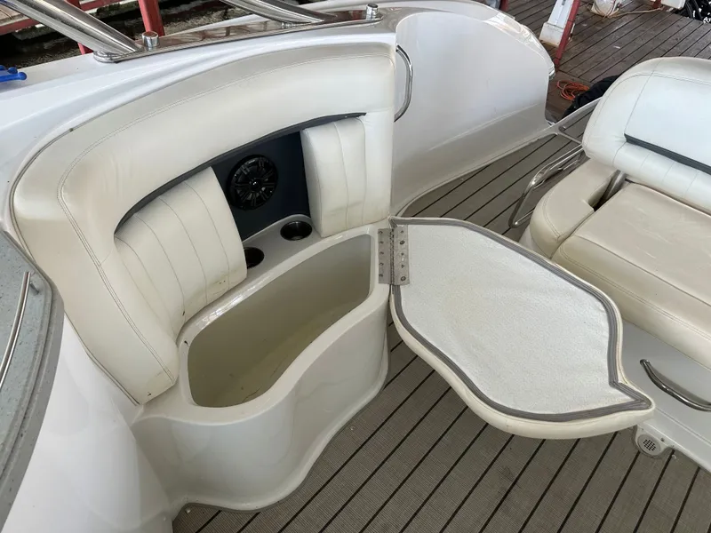Slide: The Image of Open storage compartment on a 2008 Cobalt 323 boat. - 14