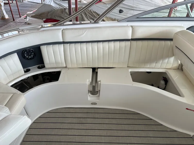 Slide: The Image of Interior of a 2008 Cobalt 323 boat with white seating. - 15