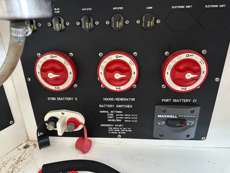 Slide: The Image of Battery switches and fuses on a 2008 Cobalt 323 boat. - 16