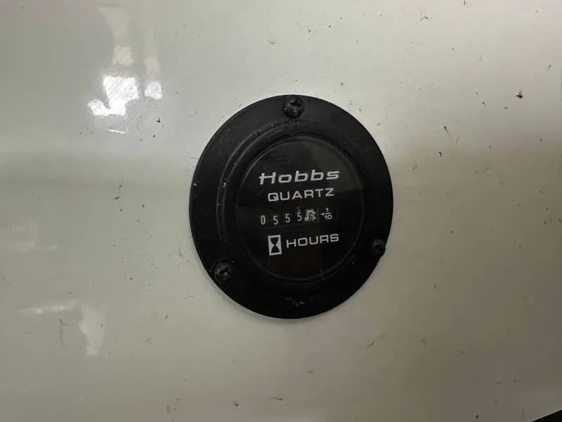 Slide: The Image of Hobbs hour meter on Cobalt 323 boat, 2008 model. - 19