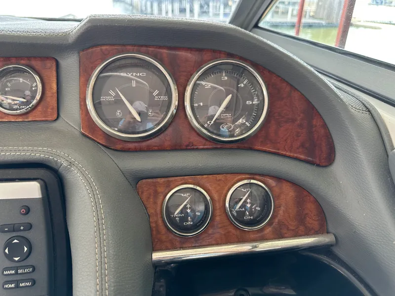Slide: The Image of Dashboard of a 2008 Cobalt 323 with wood accents. - 29
