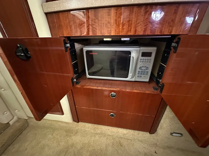 Slide: The Image of Microwave in wooden cabinet on 2008 Cobalt 323 boat. - 38