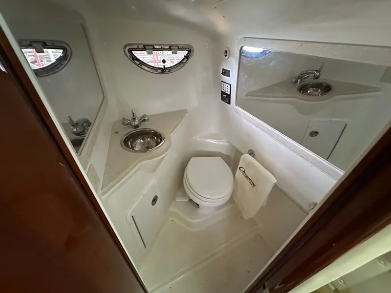 Slide: The Image of Interior of a 2008 Cobalt 323 yacht with toilet and sink. - 44