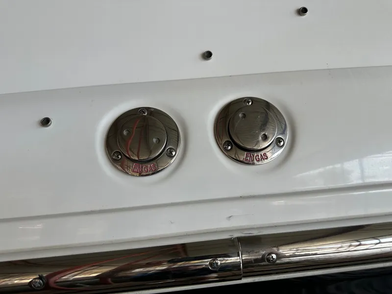 Slide: The Image of Fuel caps on a 2008 Cobalt 323 boat, stainless steel fittings. - 46