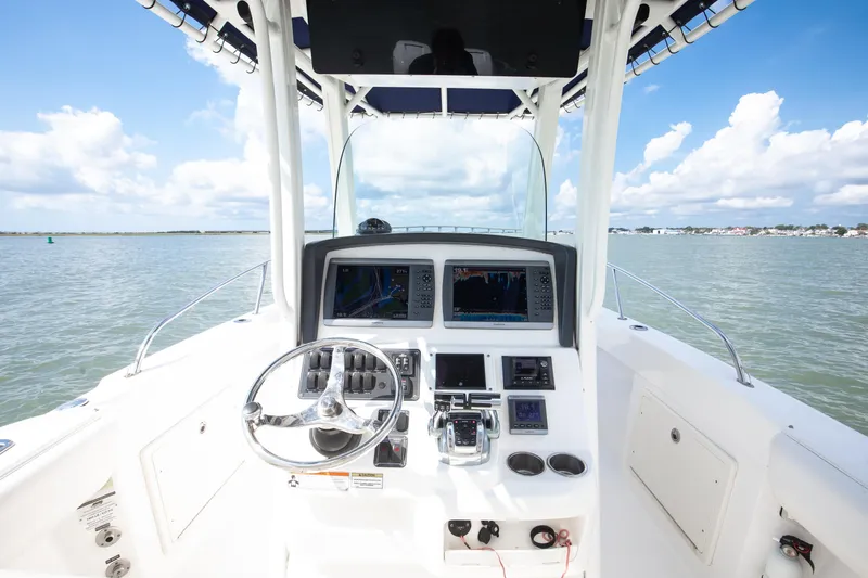 Slide: The Image of 2010 Boston Whaler 250 Outrage helm with navigation equipment - 32