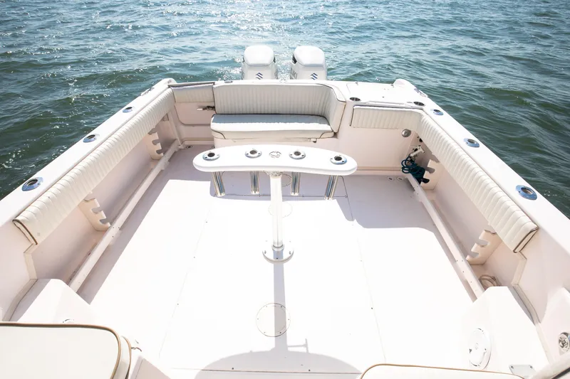 Slide: The Image of 1997 Grady-White Marlin 300 boat deck with seating and ocean view. - 53